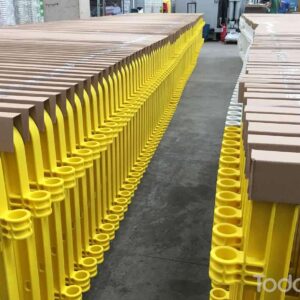 multiple plastic barricades in yellow