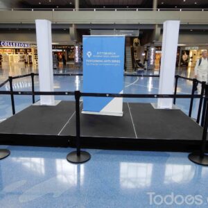 Retractable belt crowd control stanchion with an extra-wide 3-inch belt.