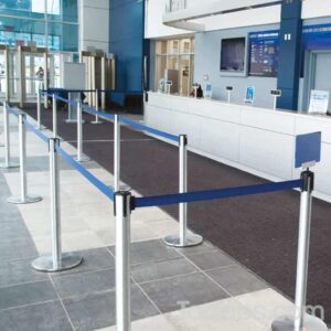 Multiple Tensabarrier 889 Advance Belted Stanchions Installed For A Queue in a Counter Area