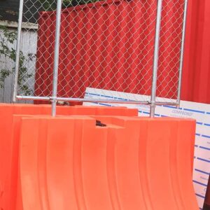 Made up of a string of plastic jersey barriers interlocked together, a water filled barrier wall ensures virtually unbreachable safety.