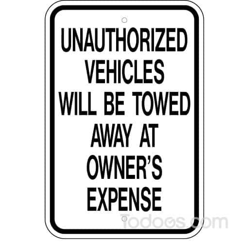 Unauthorized Vehicles Will Be Towed Sign Warns About Parking